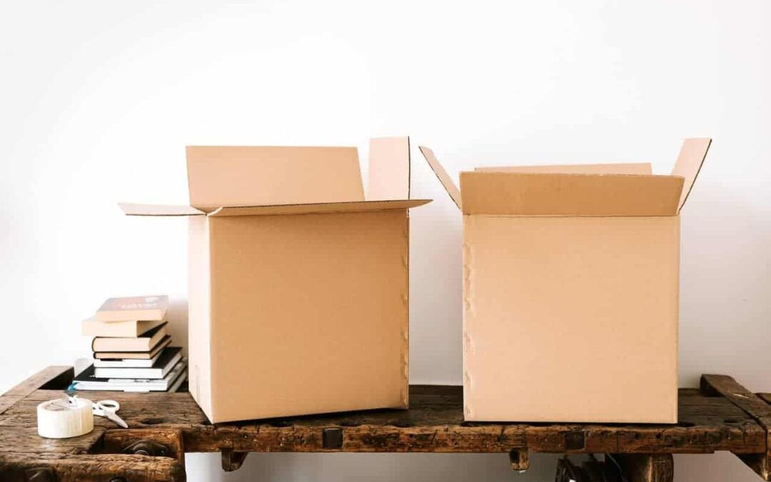 Two open cardboard boxes on a table.