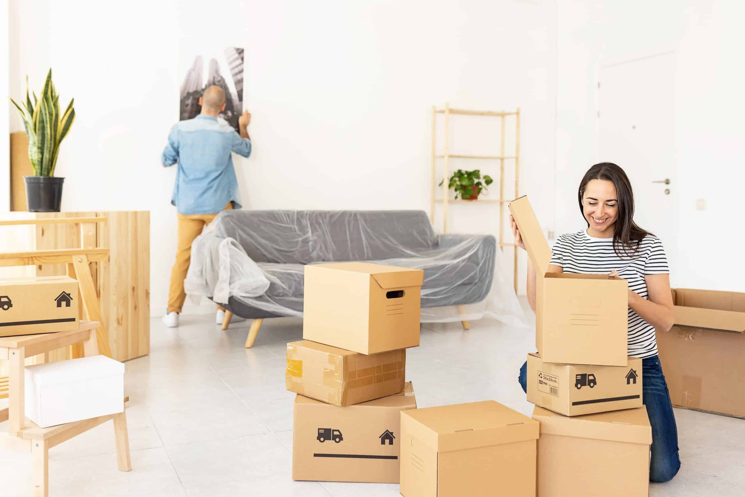 couple packing for house move